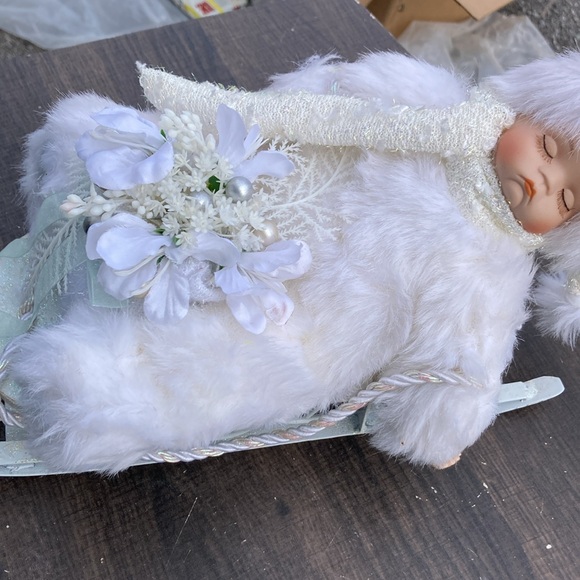 Snowy Porcelain Baby on a Sleigh - Picture 3 of 6